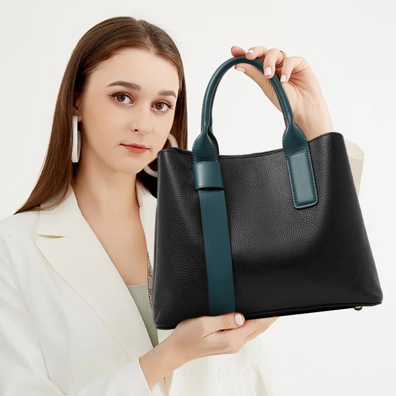 Sac à main chic en cuir color-block avec poignées supérieures