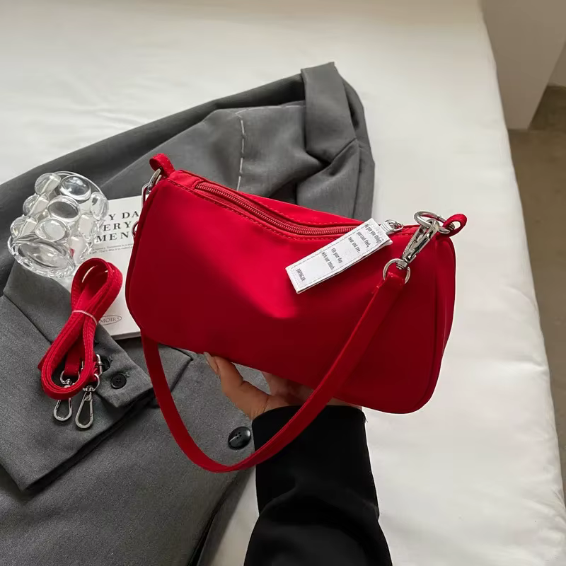 Sac à bandoulière rouge pour femmes, nouveau sac à main haut de gamme Sensation sous les bras Simple