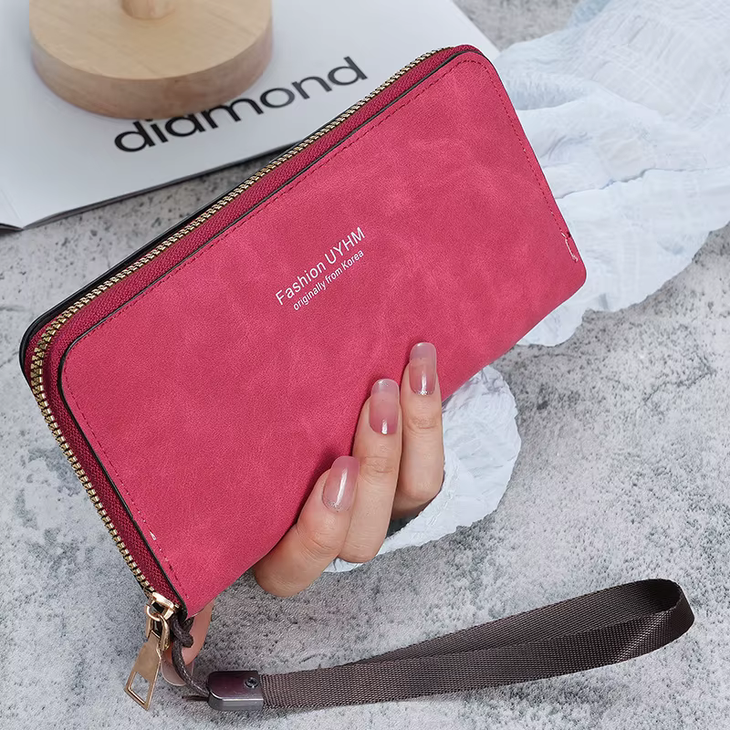 Dames tenant un long portefeuille 2025 nouveau sac à main coréen multi-fonction sac de carte sac de 