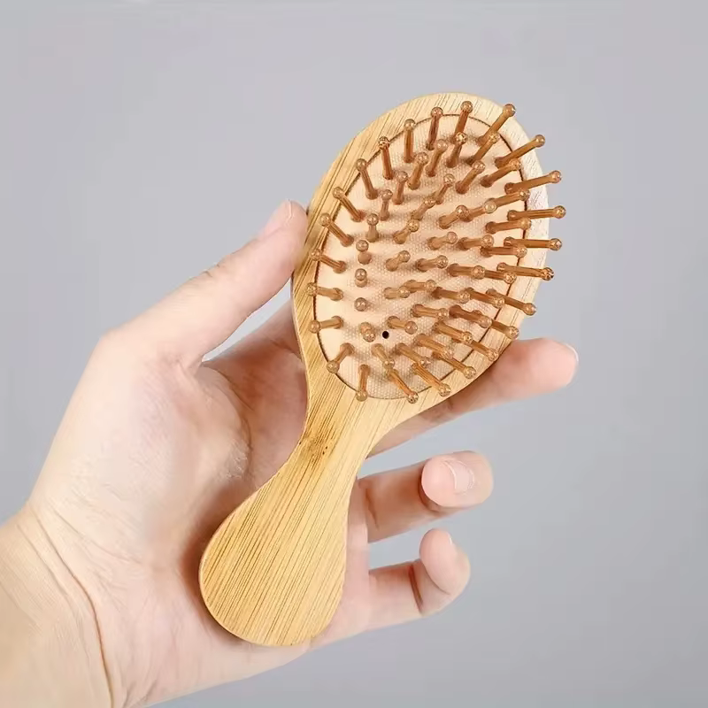 Peigne à coussin d'air en bois de bambou avec poils de Massage, dents larges, peigne à Airbag, bross