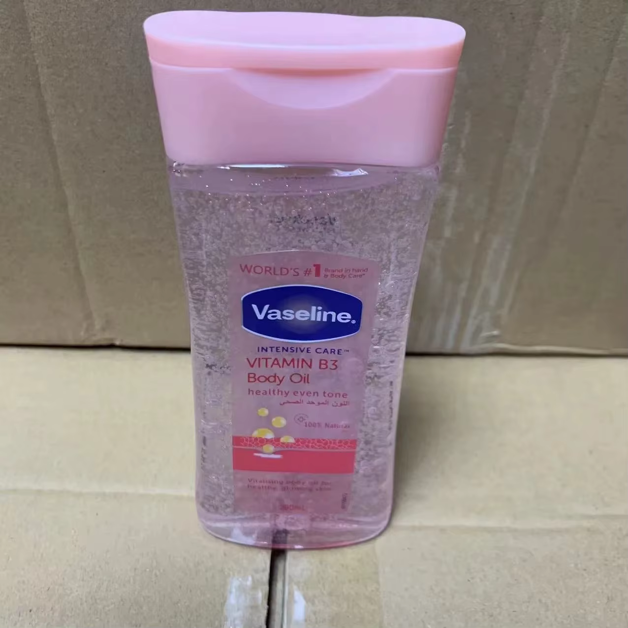 Huile Corporelle Éclatante au Cacao Vaseline 200ml – Soin Hydratant Longue Durée, Huile de Soin Corp