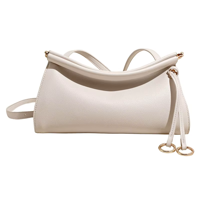 Sac à bandoulière en cuir vintage avec silhouette structurée, élégant et léger, idéal pour le travai