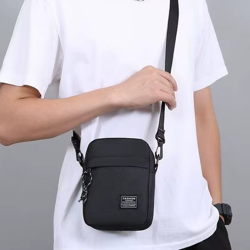 Sac bandoulière décontracté et élégant pour homme, sac à bandoulière minimaliste en nylon avec poche avant, idéal pour les trajets quotidiens