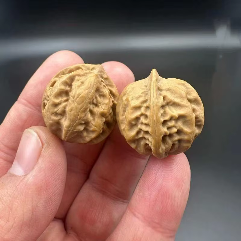 Lot de 2 balles de massage pour les mains en noyer Wenwan naturel