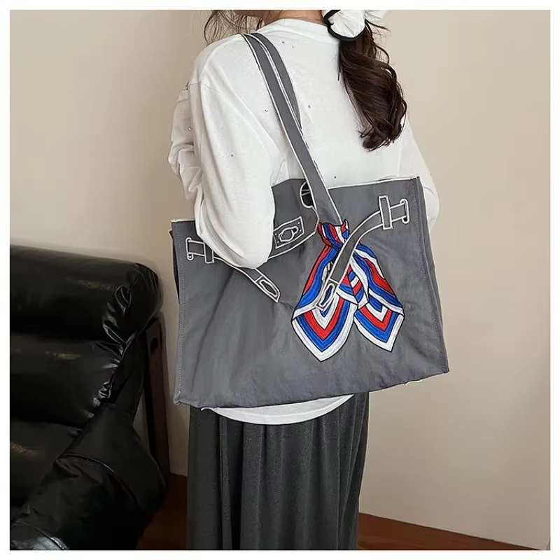 Sac à bandoulière brodé créatif 2026 pour femme, sac à main de haute qualité grande capacité, sac à main jeune et élégant avec fil à coudre, sac à main pour femme