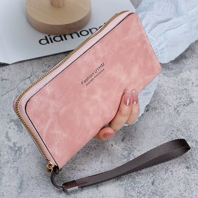 Dames tenant un long portefeuille 2025 nouveau sac à main coréen multi-fonction sac de carte sac de téléphone portable porte-monnaie femme portefeuille