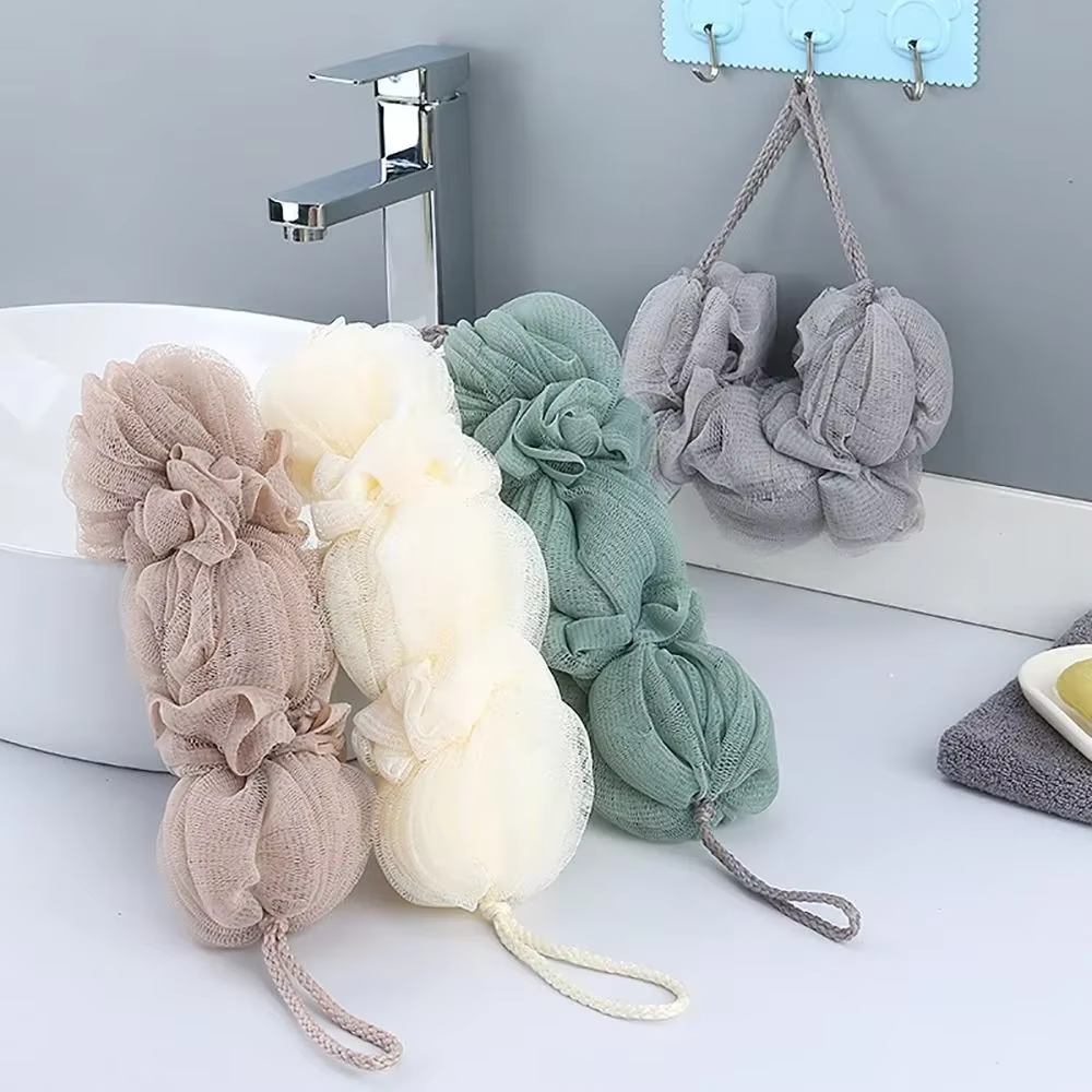 Brosse exfoliante en maille pour le corps
