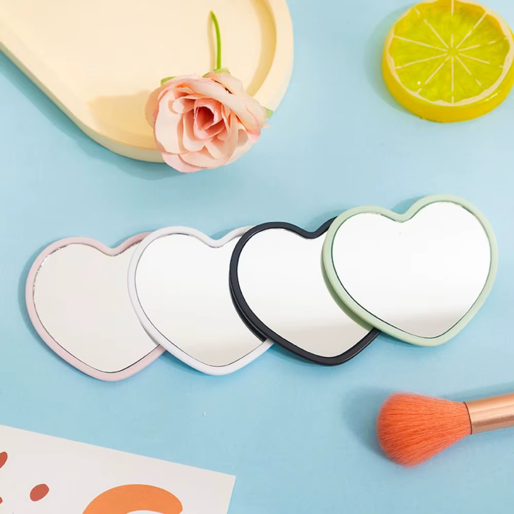 Miroir moderne simple face en forme de cœur, petit miroir à main haute définition, miroir de maquillage de beauté pour filles
