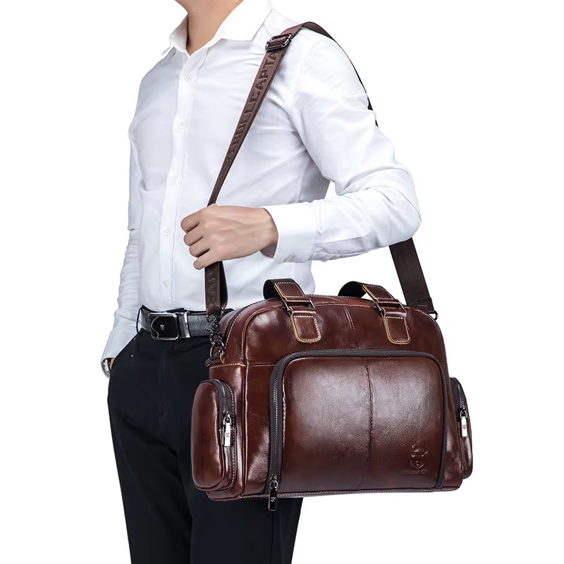 Sac à main en cuir véritable pour homme, sac de voyage en cuir de vachette de luxe, fourre-tout décontracté, étui à bombes, sac latéral professionnel lancé par ordinateur portable