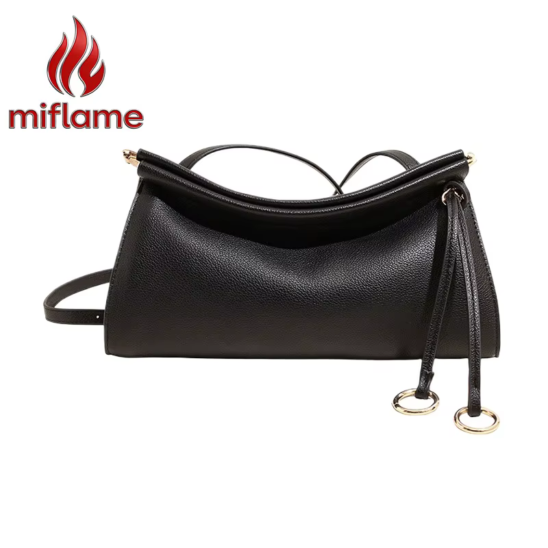 Sac à bandoulière en cuir vintage avec silhouette structurée, élégant et léger, idéal pour le travail, les trajets quotidiens
