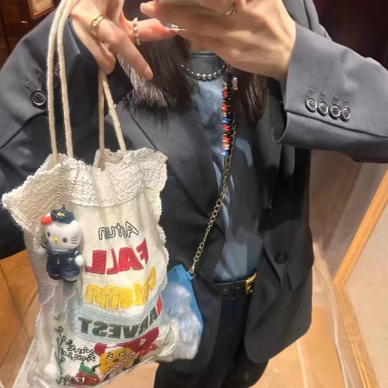 Sac à bandoulière pour femmes nouveau modèle de pomme de terre de dessin animé créatif sac à bandoulière brodé décontracté à la mode sacs à main en toile polyvalents