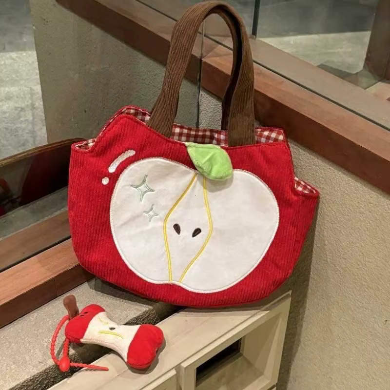 Sac à main pomme rouge créatif et mignon en velours côtelé, sac à bandoulière élégant en toile pour les sorties avec pendentif pomme, sac à bandoulière décontracté et polyvalent