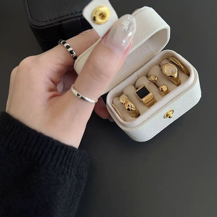 Mini Portable petit sac de rangement de bijoux voyage Simple en cuir anneau collier boucles d'oreilles boîte de rangement organisateur affichage boîte-cadeau