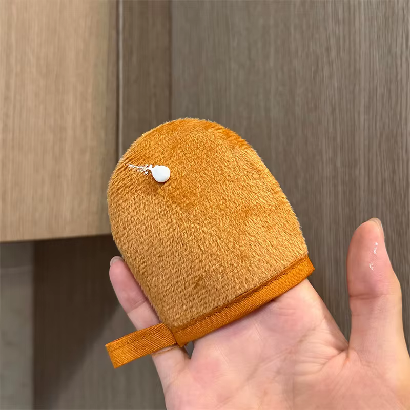 Gant d'application auto-bronzant