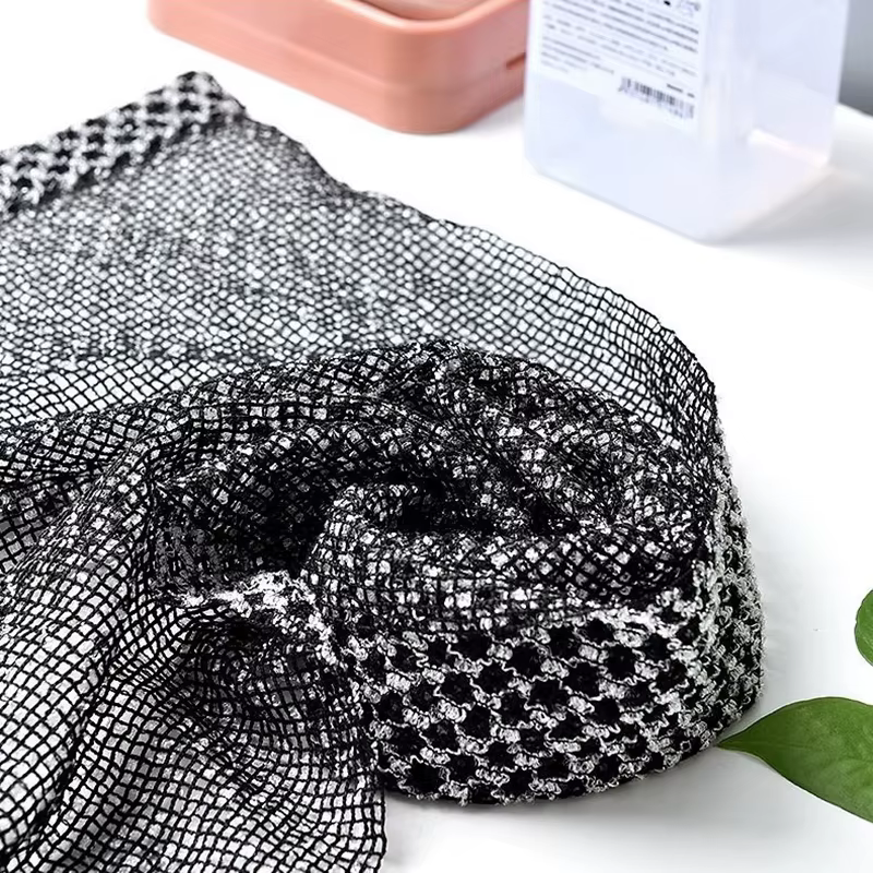Serviette à friction pour prendre une douche