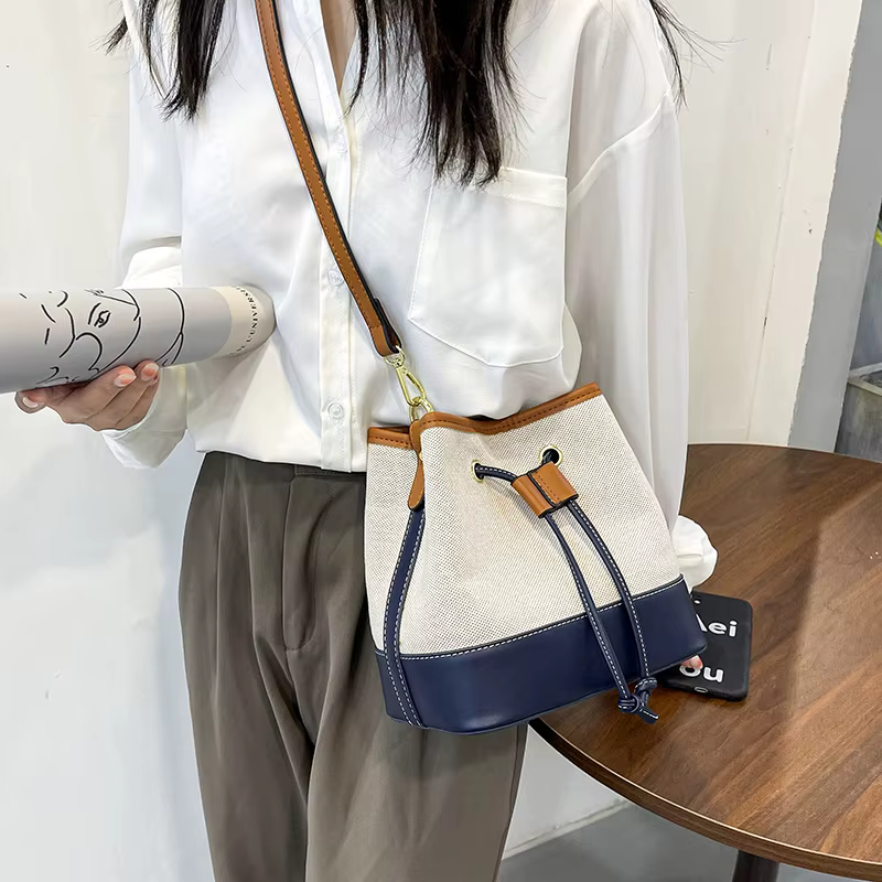 Sac seau en toile pour femmes, sacs à main de luxe de styliste, sac à bandoulière en PU, fourre-tout à la mode pour les déplacements quotidiens