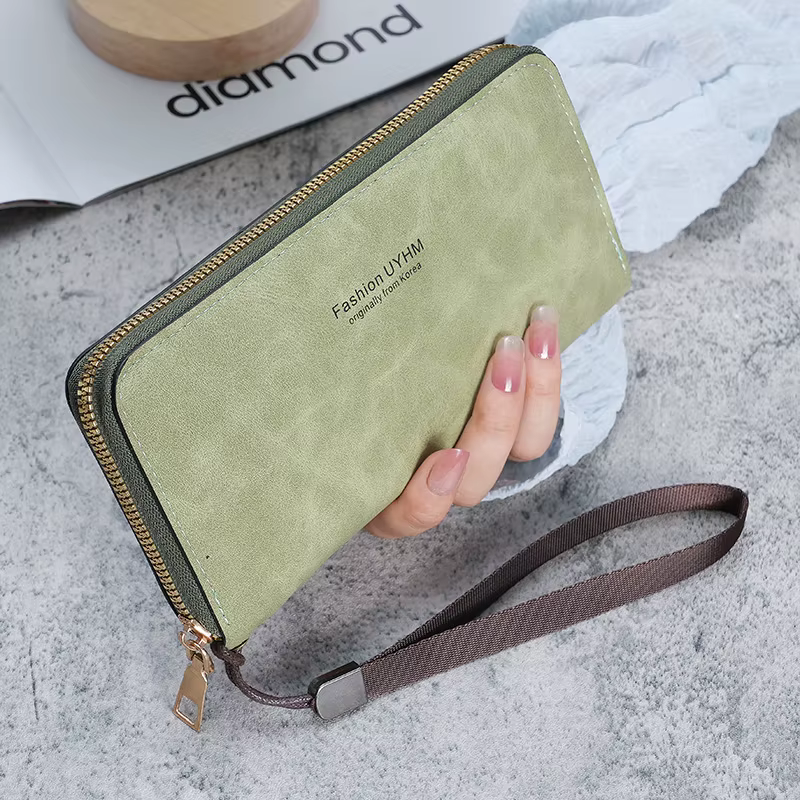 Dames tenant un long portefeuille 2025 nouveau sac à main coréen multi-fonction sac de carte sac de téléphone portable porte-monnaie femme portefeuille