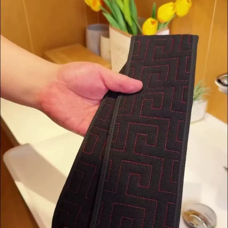Longue serviette exfoliante pour le dos