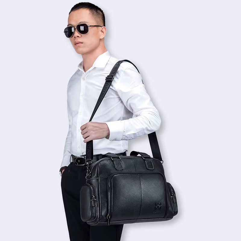Sac à main en cuir véritable pour homme, sac de voyage en cuir de vachette de luxe, fourre-tout décontracté, étui à bombes, sac latéral professionnel lancé par ordinateur portable