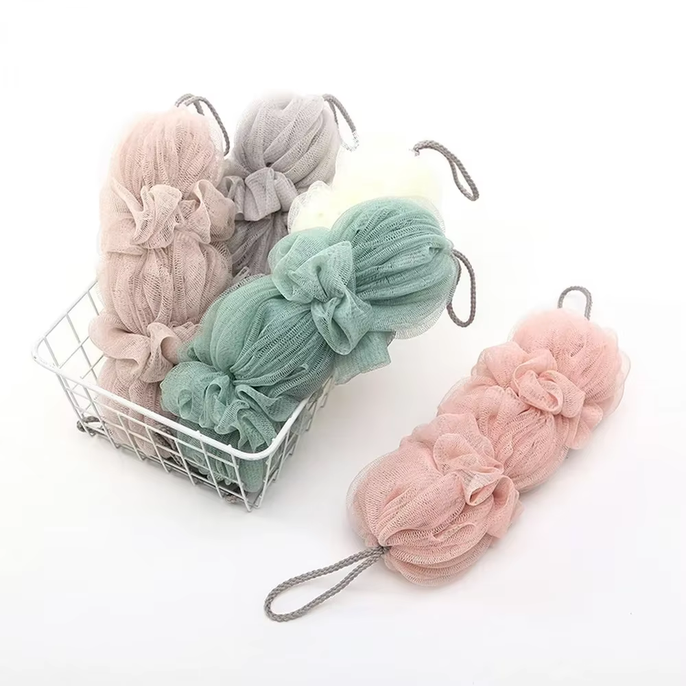 Brosse exfoliante en maille pour le corps