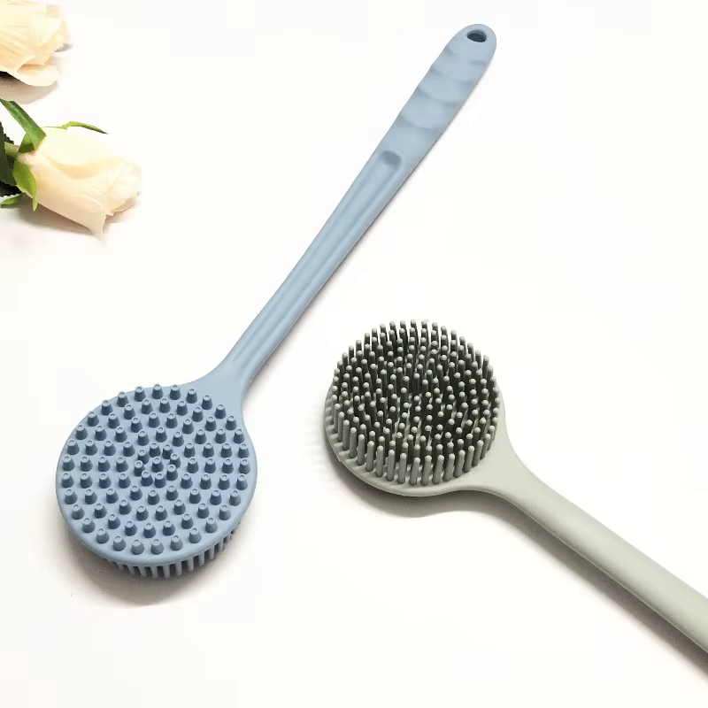 Brosse de douche exfoliante en silicone souple avec poignée pour le dos