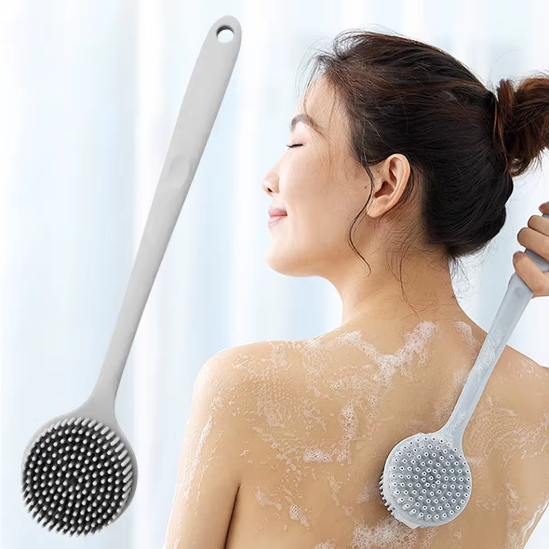 Brosse de douche exfoliante en silicone souple avec poignée pour le dos