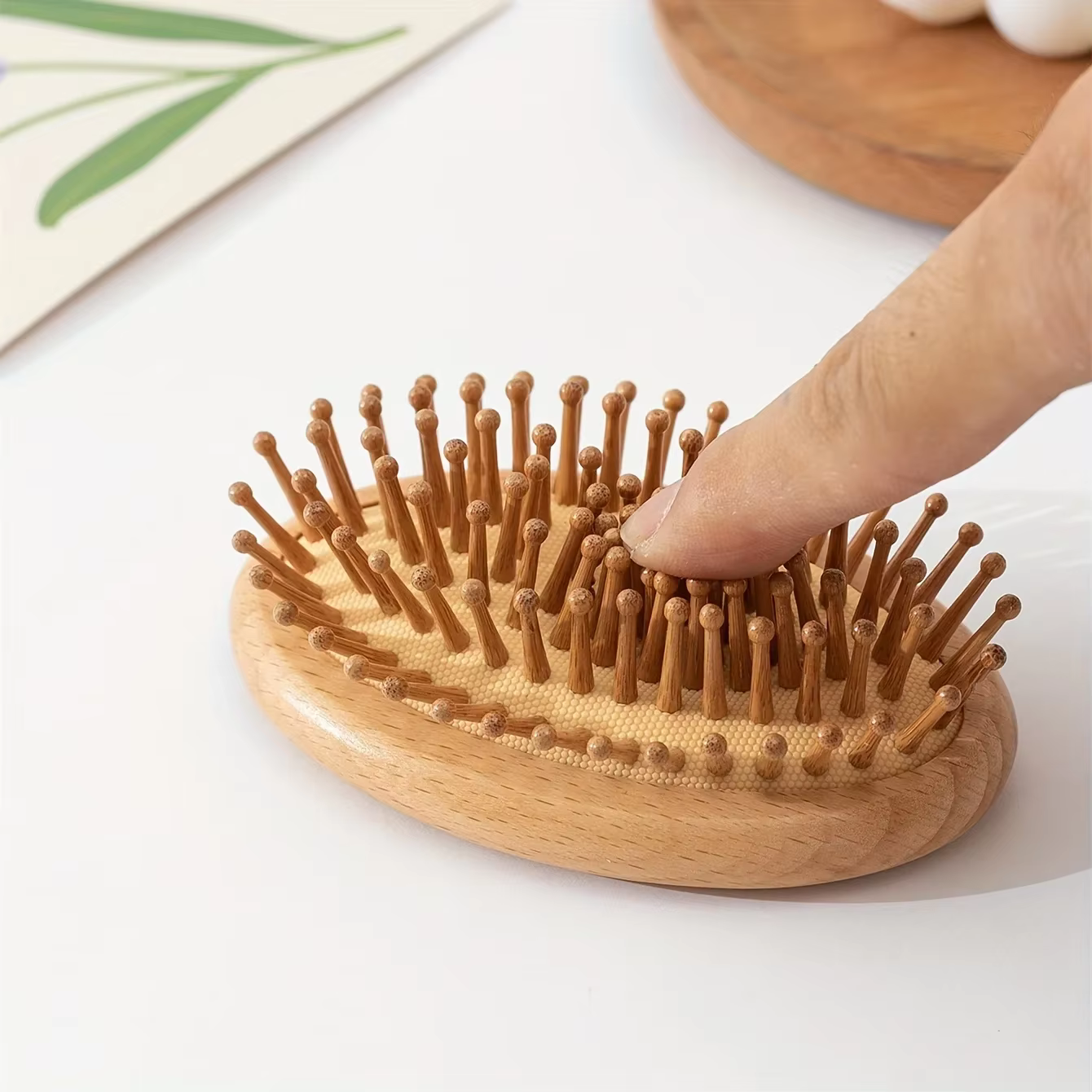 Peigne à coussin d'air en bambou et bois