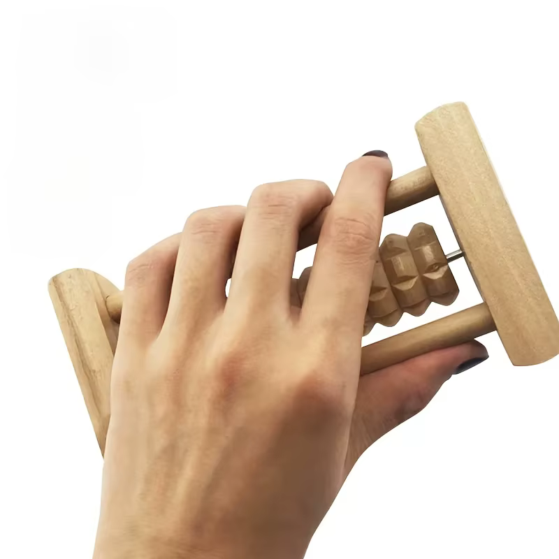 Rouleau de réflexologie en bois naturel conçu pour améliorer la relaxation