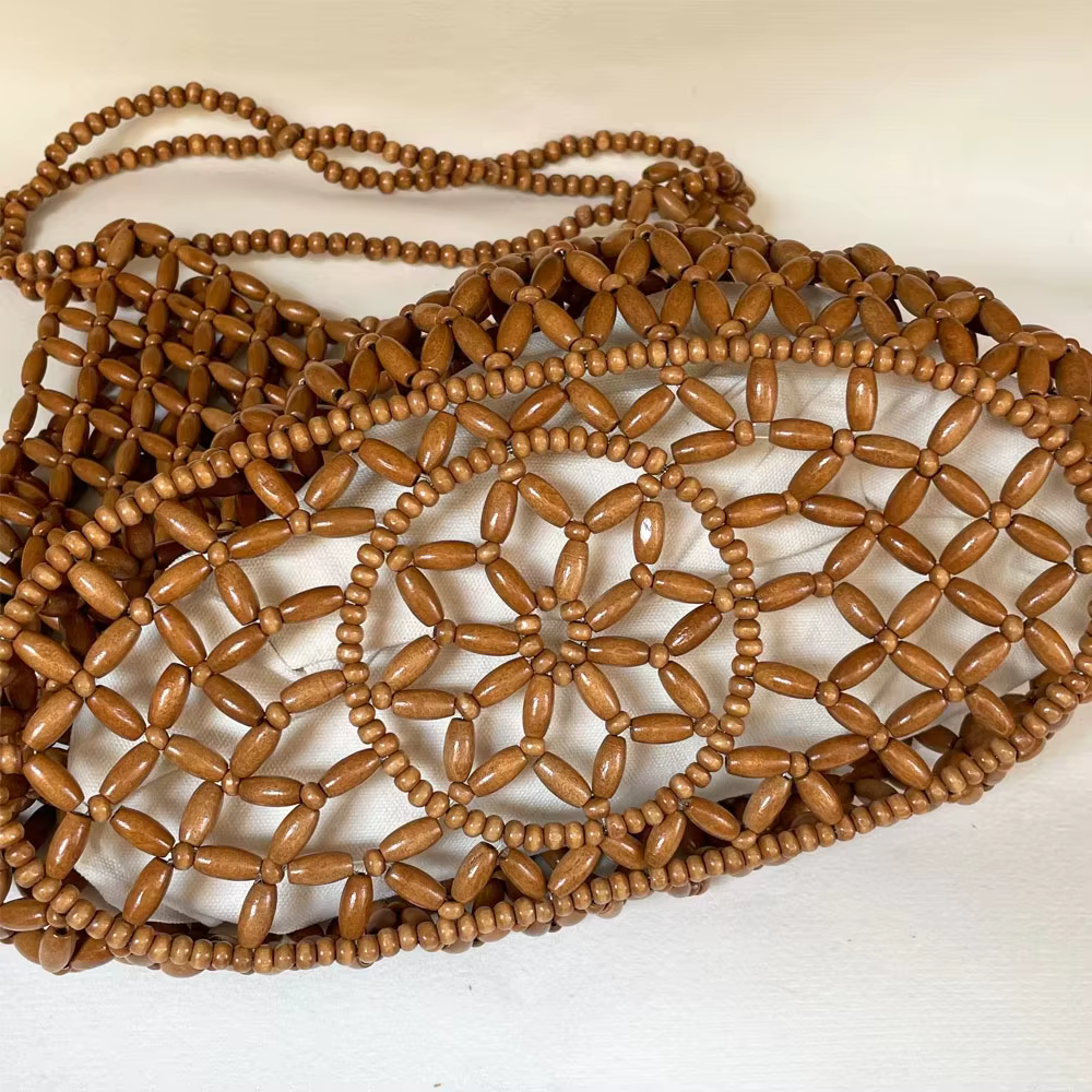 Sac à main tissé à la main avec perles pour femmes, sac à bandoulière exquis en perles de bois ajourées, sac de plage féminin