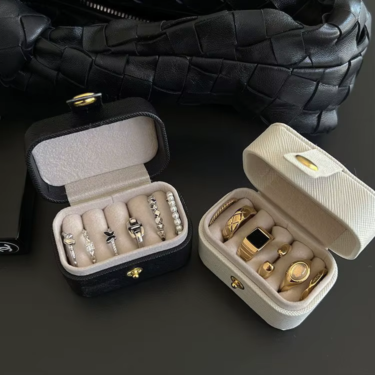 Mini Portable petit sac de rangement de bijoux voyage Simple en cuir anneau collier boucles d'oreilles boîte de rangement organisateur affichage boîte-cadeau