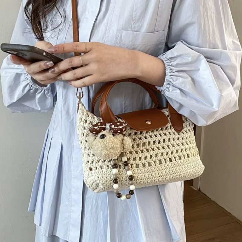 Sac à dumplings tissé à la main pour femme, nouvelle collection 2026, sac de voyage, sac en paille tissé à la main de niche, sac bandoulière messager
