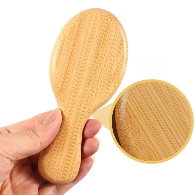 Brosse à cheveux en bambou avec coussin d'air et picots massants