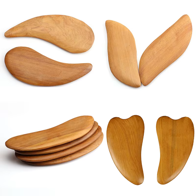 Grattoir Gua Sha en bois
