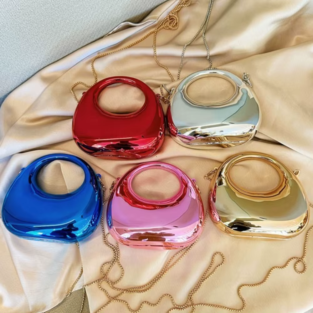 Demi-lune fête Banquet sac pour femmes sac à main De luxe Bolso De Mujer vente chaude femmes sac à bandoulière 2025 nouveau PVC lustre métallique