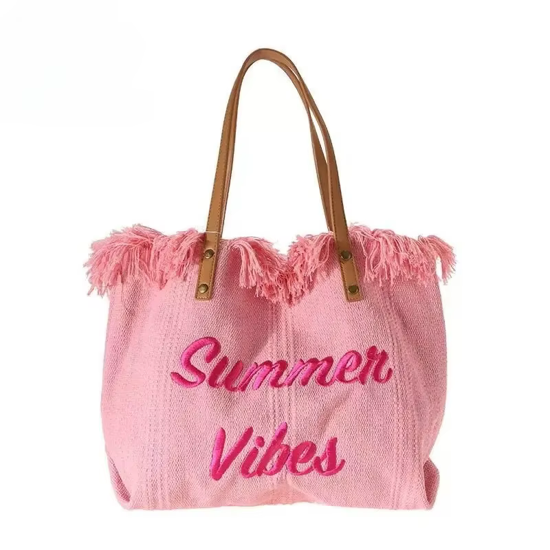 Sac à main femme design simple, sac de voyage de niche, sac de plage fourre-tout, sac à bandoulière grande capacité avec broderie lettre et pompon, tendance 2022